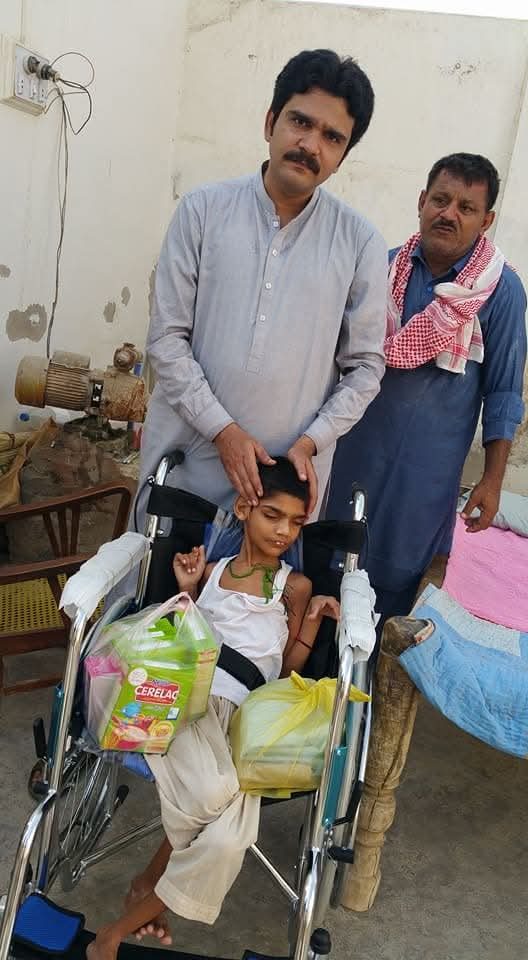 ZDO providing a wheelchair and essentials to a child with a disability